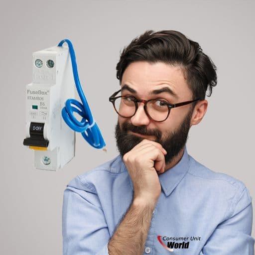 Man pondering next to a FuseBox RCBO circuit breaker with blue wire on grey background