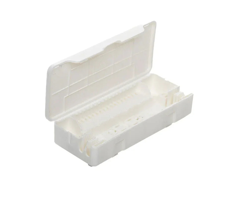 White plastic electrical enclosure socket box with open lid on white background