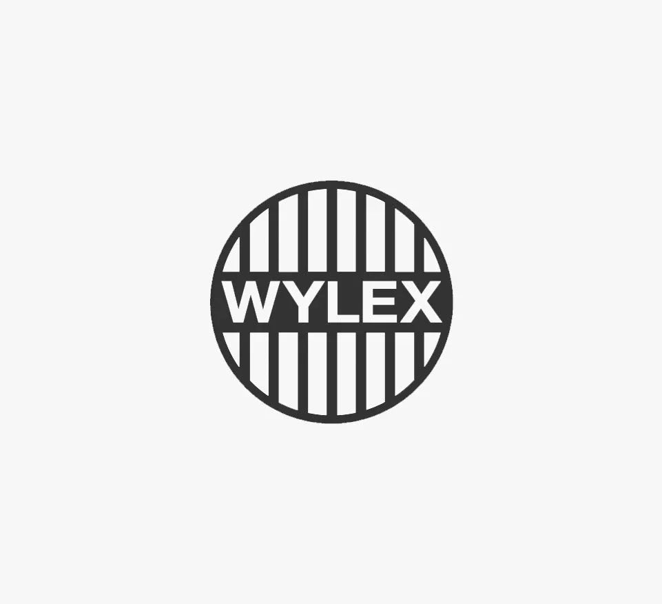 Wylex logo in a black circle with vertical white stripes on a plain background