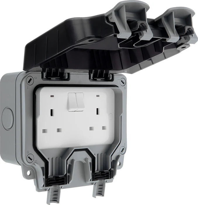 Electrical outlet with a protective cover on a white background