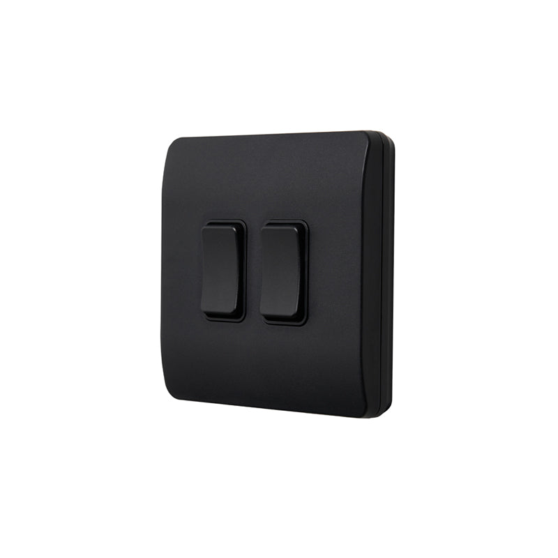 Black square switch with two double rocker switches on a white background